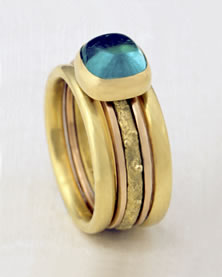 Five band 'Stacking Ring Single-stone' with green Tourmaline cabochon